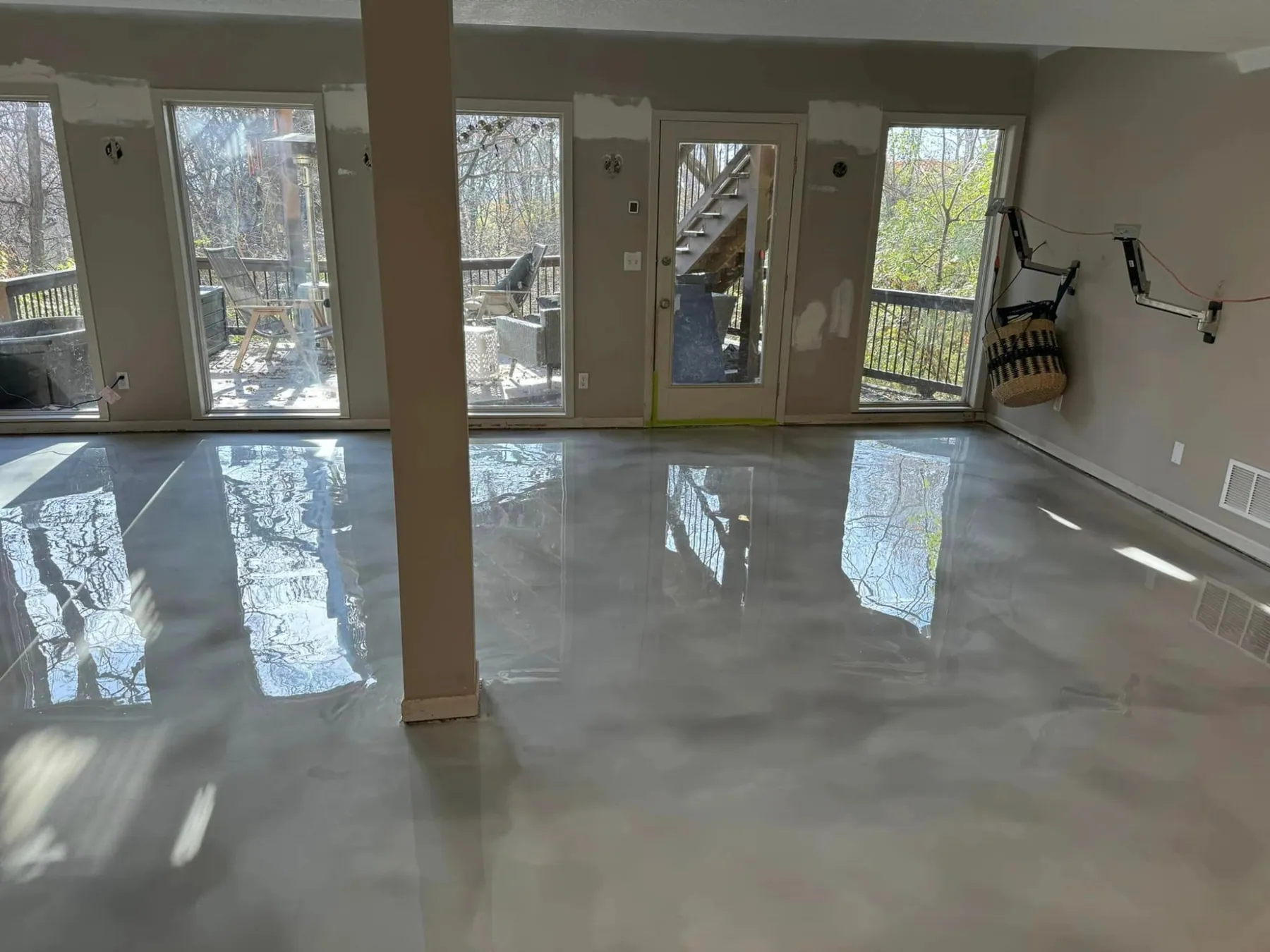 The same room finished with a reflective metallic epoxy floor