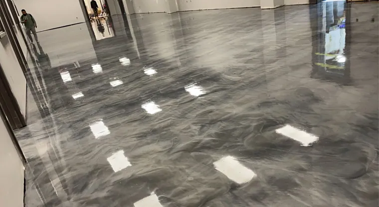 Grey and white marbled metallic epoxy in a commercial interior